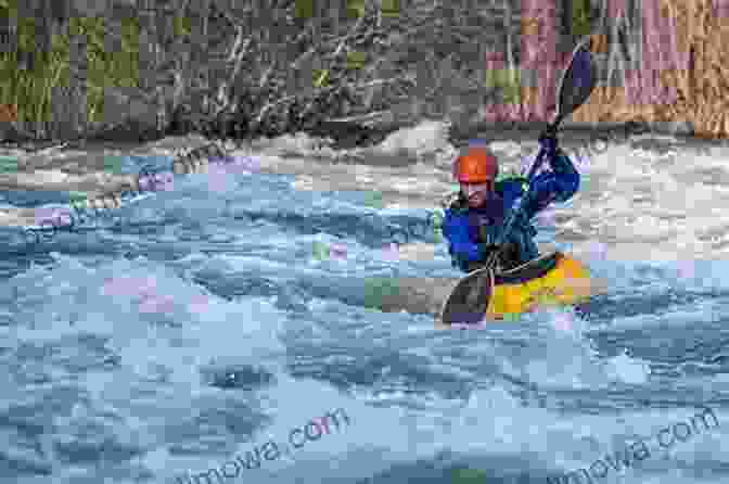 A Kayaker Paddling Through A River With Small Rapids, Surrounded By Towering Cliffs And Dense Forests Paddling Idaho: A Guide To The State S Best Paddling Routes (Paddling Series)