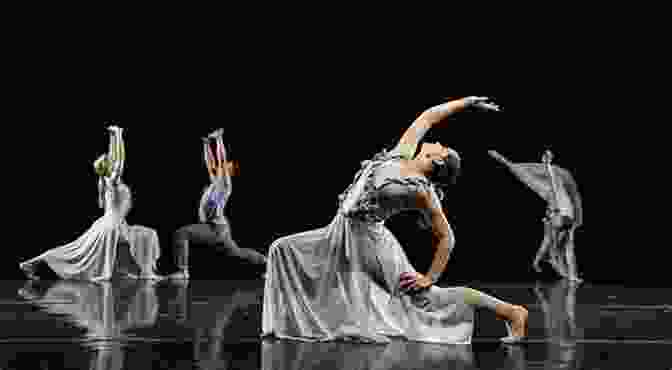 A Modern Dance Performance Featuring Innovative Lighting That Complements The Dynamic Choreography The Art Of Light On Stage: Lighting In Contemporary Theatre