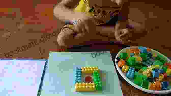 Child Arranging Blocks To Form A Multiplication Array Tables Time : 50 Easy And Fun Ways To Practise Times Tables At Home